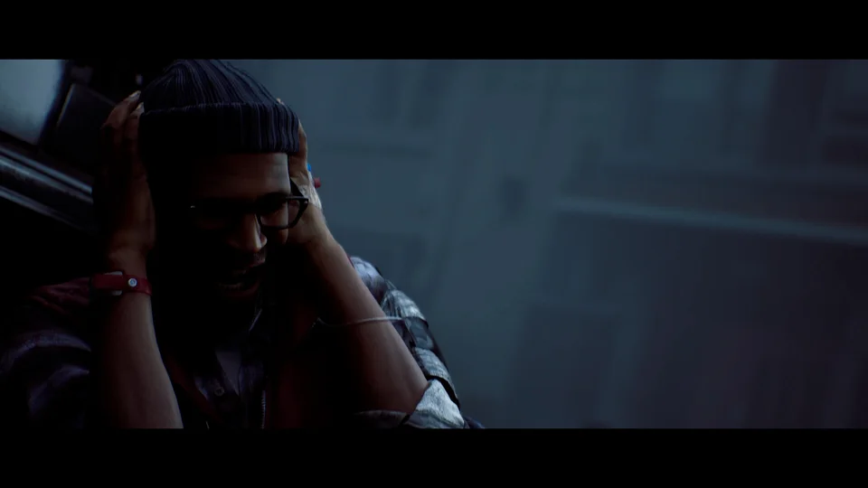 Simon stands in a foggy street with both hands pressed against his head